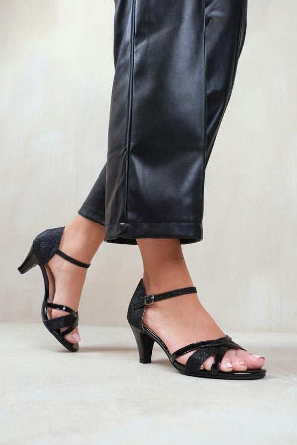 Where's That From Artemis Mid High Heel With Buckle Ankle Strap in Black Glitter