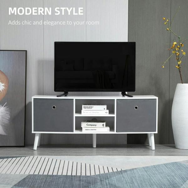 White TV stand with flat-screen TV and two grey drawers, open middle for media storage