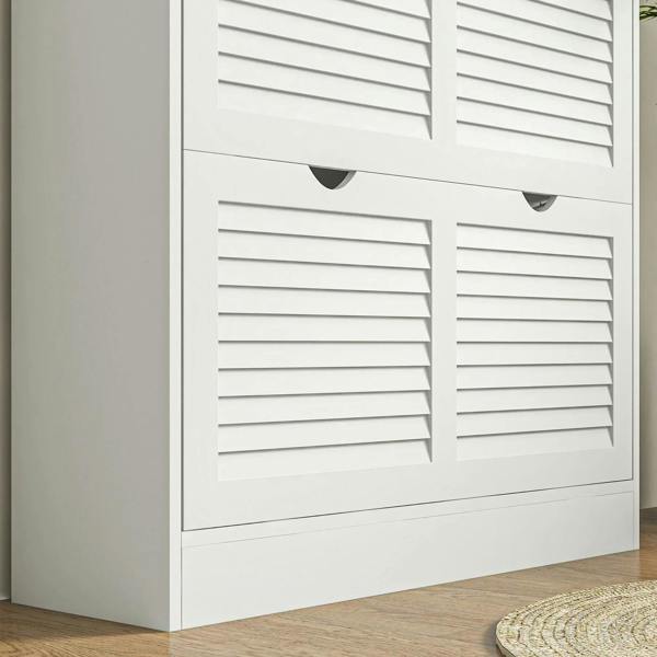 White louvered flip drawer doors with horizontal slats and dark handle cutouts