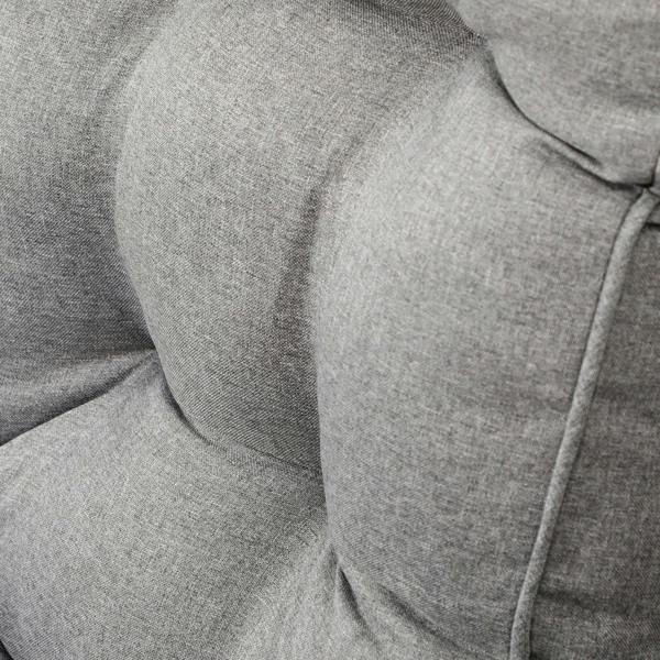 Close-up of grey upholstered outdoor cushion padding