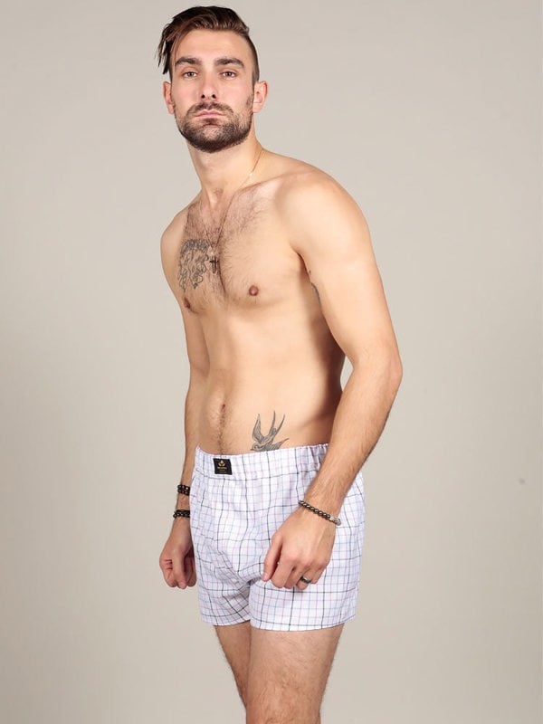 Male model wearing chequered cotton boxers