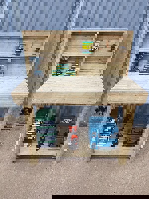 Indoor/Outdoor Pressure-Treated Single Shelf with back panel Workbench, a robust and versatile solution for all your workspace needs. Handcrafted in the UK, this workbench is constructed from high-quality, pressure-treated timber, ensuring durability and resistance to the elements, making it suitable for both indoor and outdoor use.