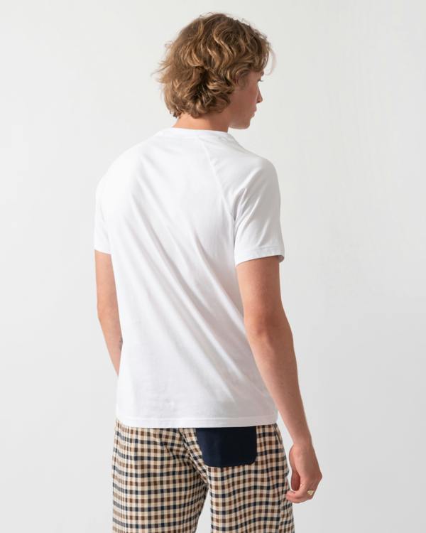 back model wearing a BOSS Orange Mens Slim Fit Beach T-Shirt in Natural 105