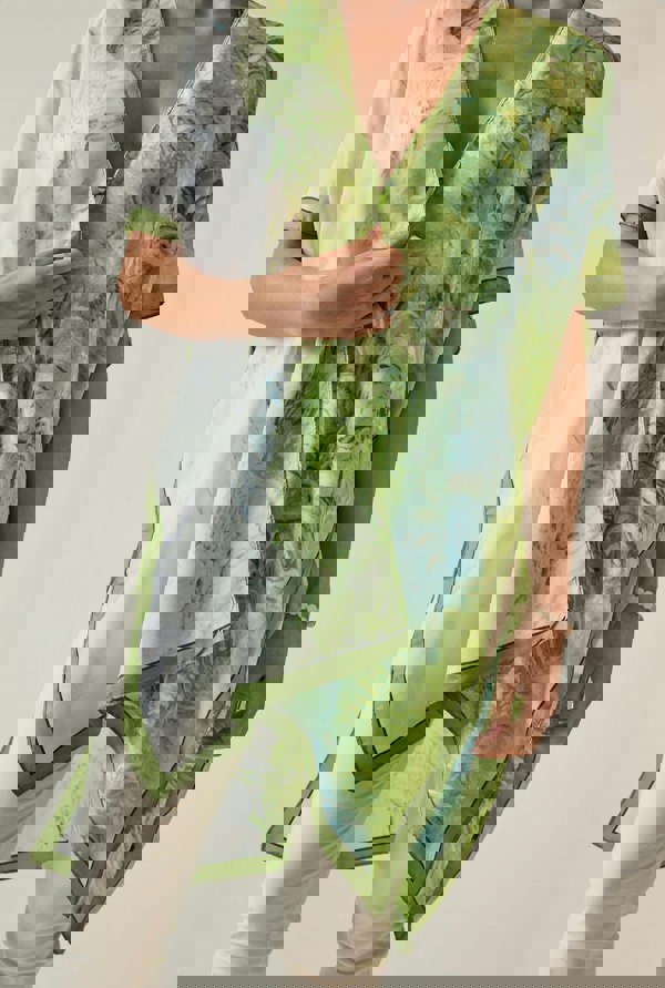 Flowy green kaftan with watercolor design