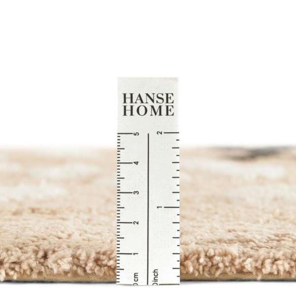 Hanse Home rug with a ruler for scale on a white background