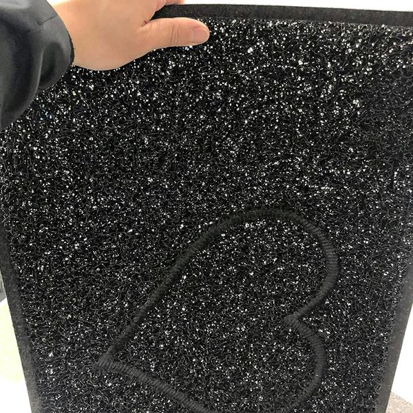 heart small embossed doormat in black with open back