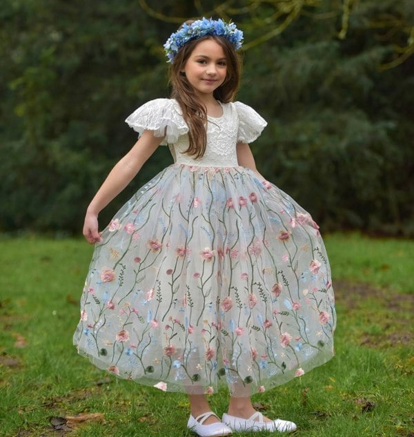 Pretty embroidered dress worn by model