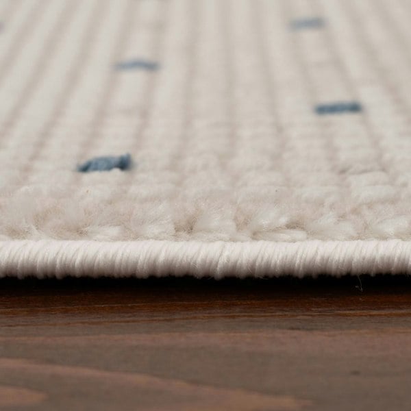 Living Room rug, blue-cream colours, dots, practicality in mind, the rug is anti-allergic.