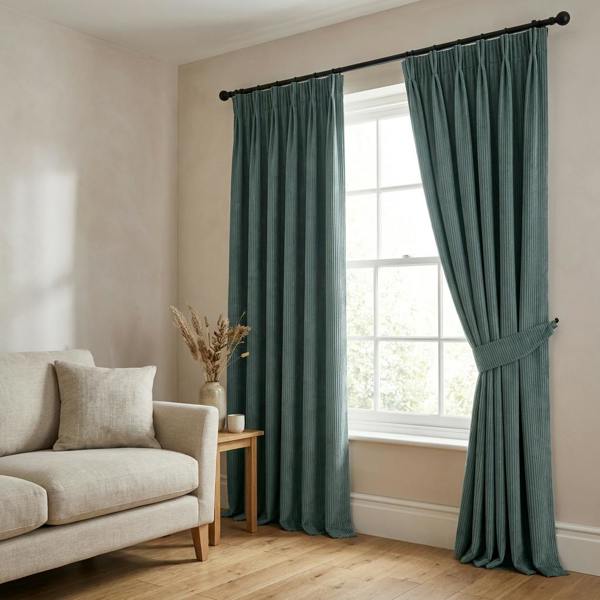 Larissa made-to-measure curtains in Lagoon, styled in a living room