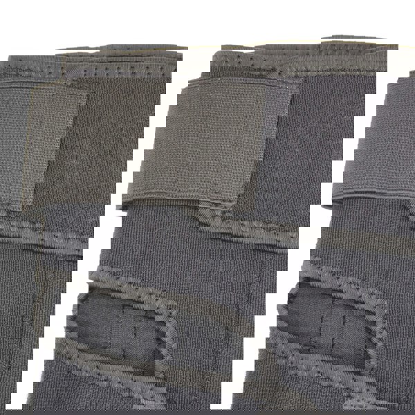 Close-up of protective knee wrap with a strap and padding detail