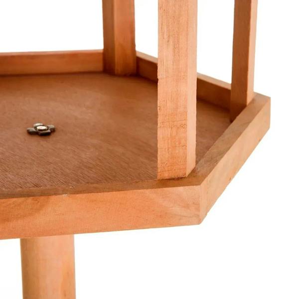 Wooden bird feeding table tray with side supports, natural wood, close-up view.