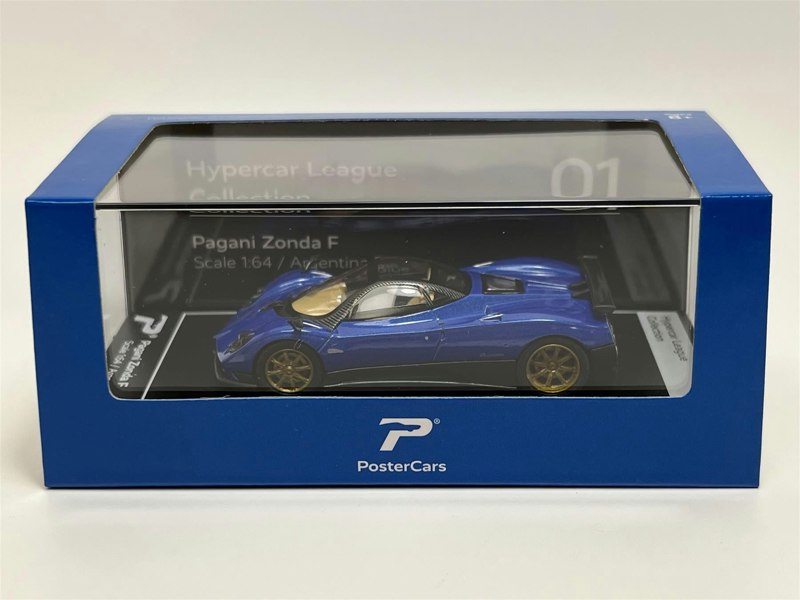 a blue toy car in a box