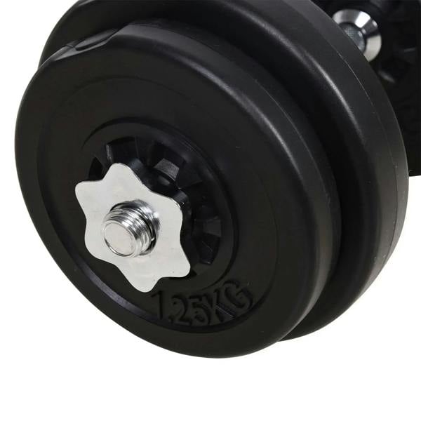 Black weight plate with star-shaped center insert and threaded bar end