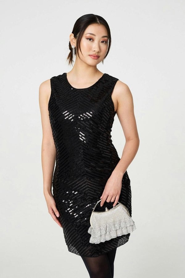 Black | Sequin Detail Sleeveless Mini Shift Dress : Model is 5'9"/175 cm and wears UK8/EU36/US4/AUS8
