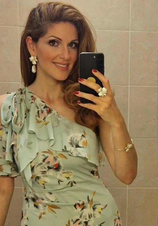 Floral jewelry set worn by a model.