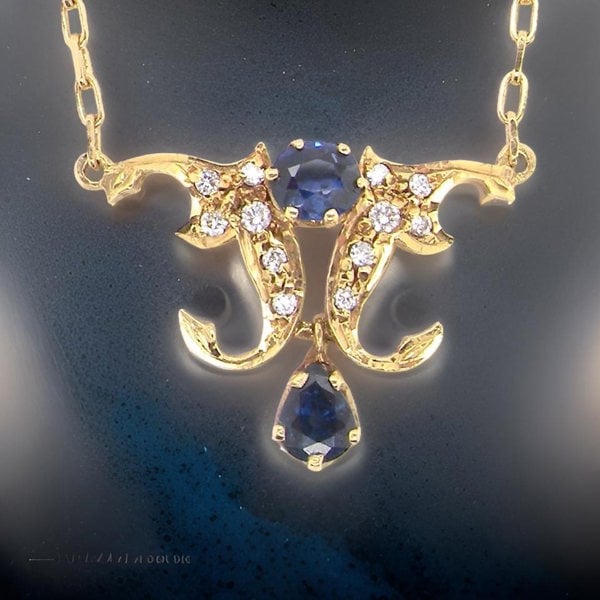 Vintage Tom A sapphire and diamond pendant