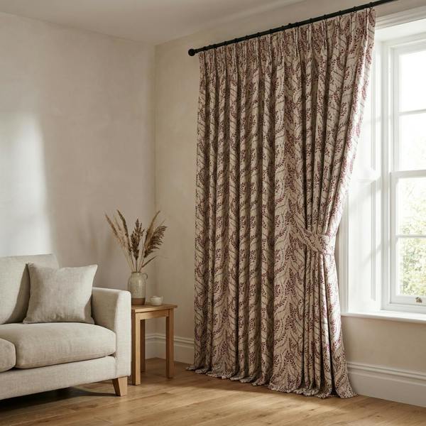 Sadie made-to-measure curtains in Rosso, styled in a living room