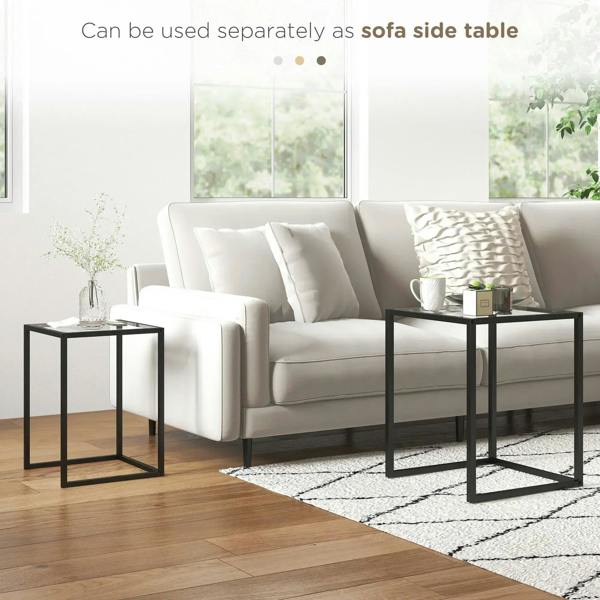Two black nesting side tables with tempered glass tops, steel frames, and open bases