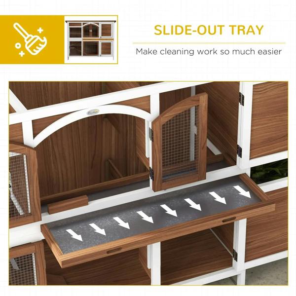 Two-tier wooden pet hutch interior featuring a slide-out cleaning tray