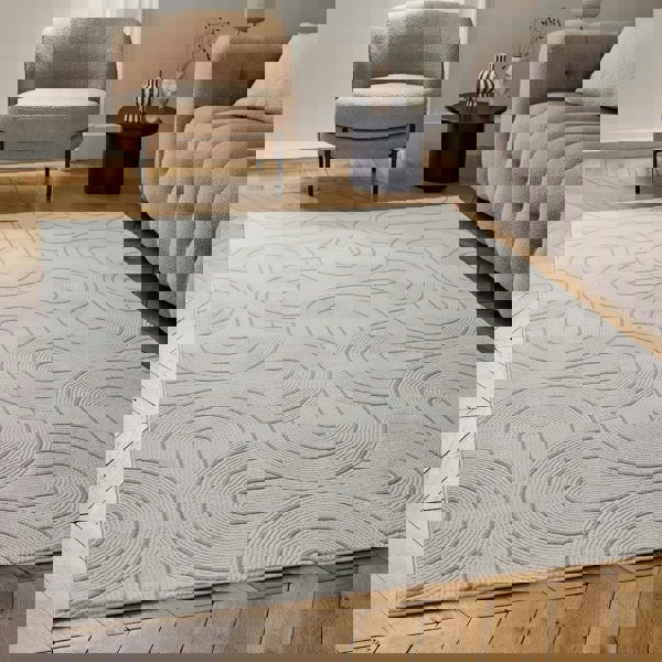 Living Room rug, beige-cream colours, geometric, practicality in mind, the rug is anti-allergic.