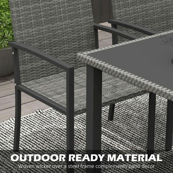 Close-up of grey woven dining chair and table frame with clean-lined armrests