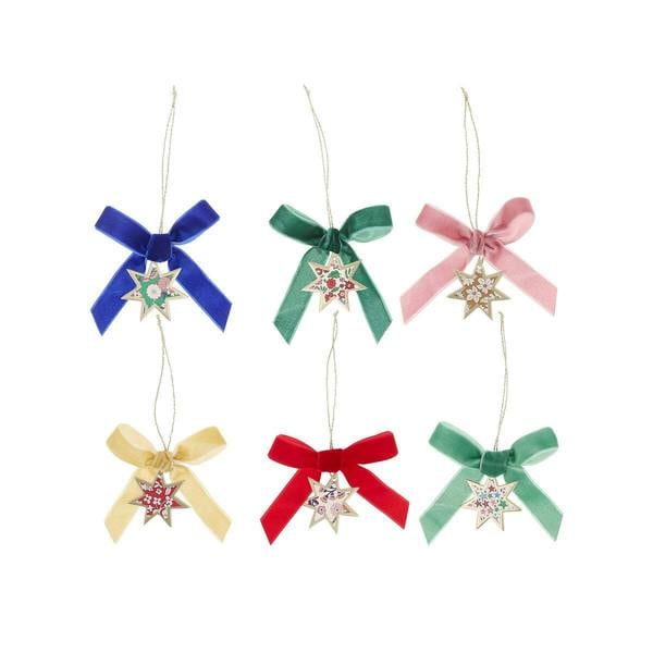 Set of six star-shaped paper Christmas tree decorations in Liberty prints, adorned with velvet bows and gold hanging threads.