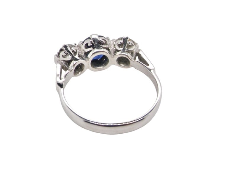 Reverse of a three stone sapphire and diamond ring