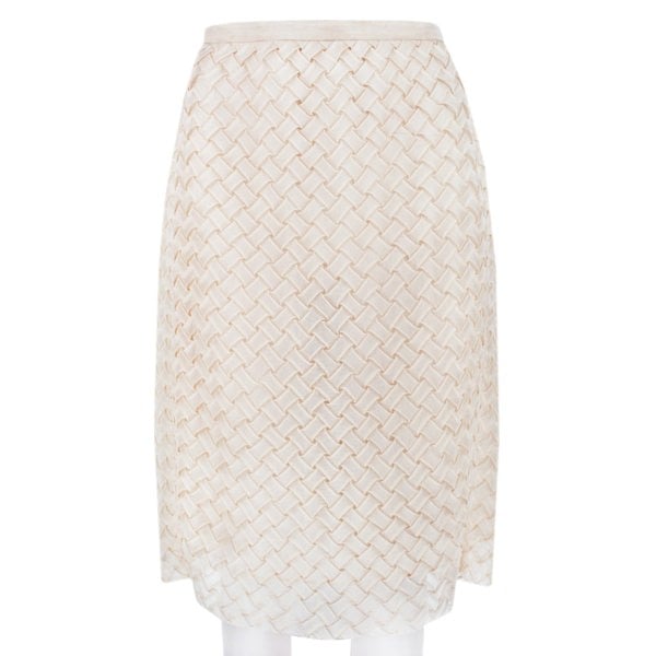 A Christopher Kane pencil skirt which is intricately shaped to appear woven