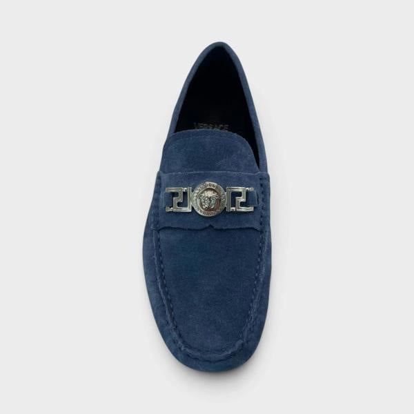 Supplied Fashion dark navy suede driver loafer with silver Versace Medusa Greca metal hardware detail