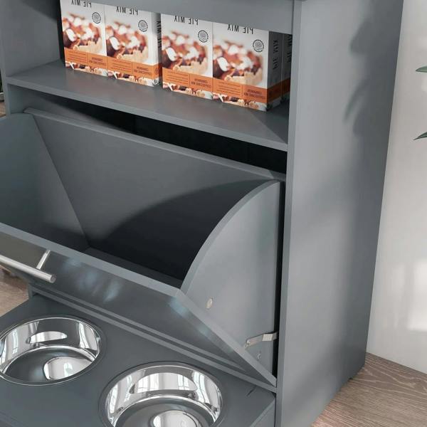Close-up of grey pet feeder cabinet open door showing interior storage space