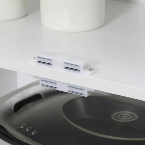 White cabinet shelf hardware with metal support rails and peg holes