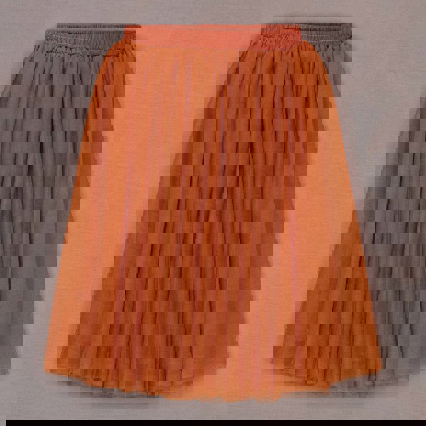 Orange skirt on a gray background