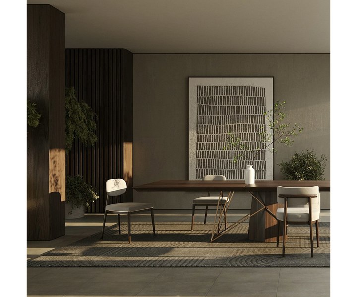 Contemporary Oscar dining chair with plush seating and elegant brass details for upscale decor.