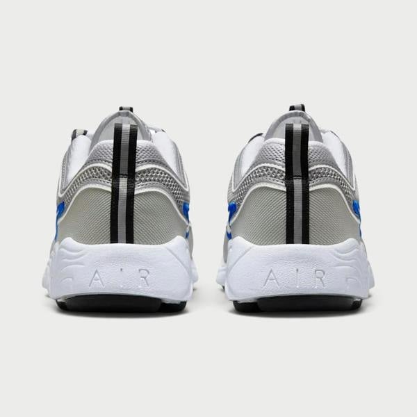 Supplied Fashion Air Zoom Spiridon SP sneakers in metallic silver grey with blue accents and white Air midsole