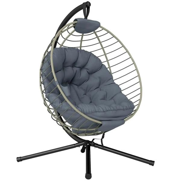 Grey hanging rattan swing chair with metal stand and tufted padded cushion