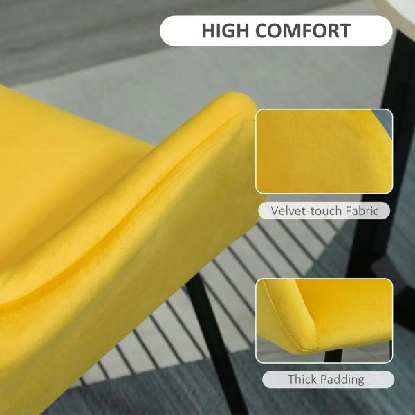 Yellow velvet-touch accent chair with thick padding and smooth curved armrest