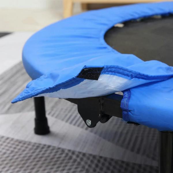 Blue padded trampoline with black safety mat and support legs