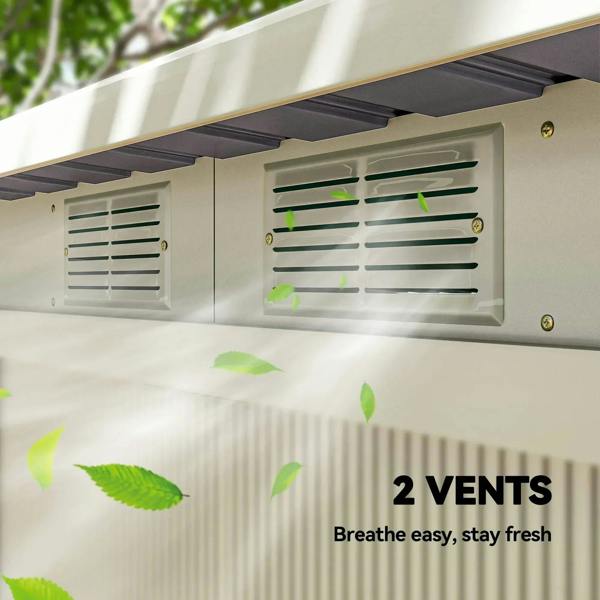 Light grey shed interior with vent panels and shelving compartments