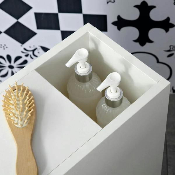 White bathroom cabinet top compartment holding two pump bottles