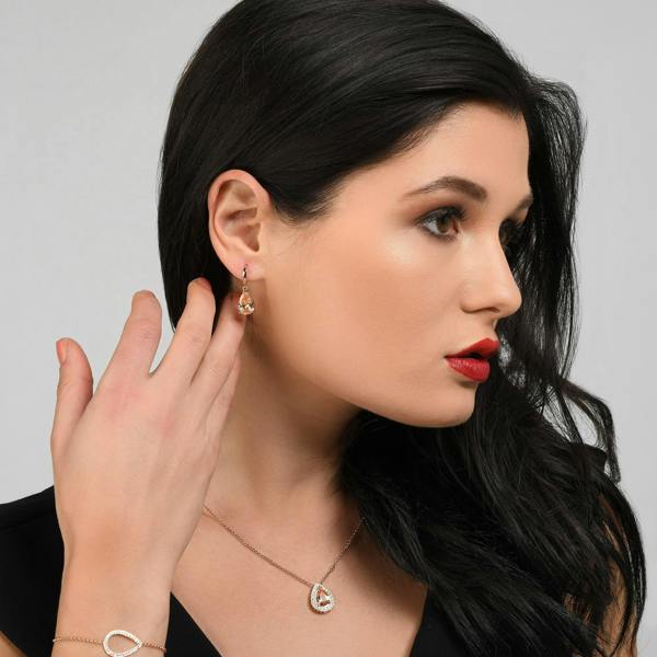 Rose Gold Pear Drop Earrings with Champagne Cubic Zirconia Stones - namana.london