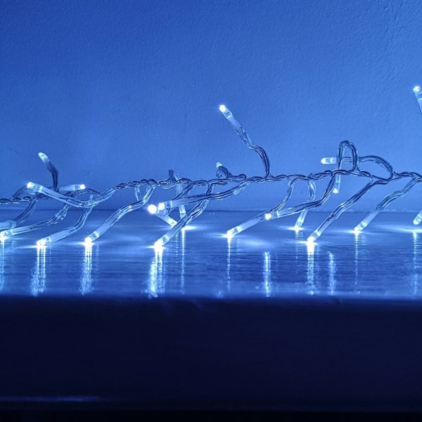 Samuel Alexander 960 LED 12m Premier Cluster Indoor Outdoor Multi Function Mains Operated Christmas Lights with Timer on Clear Cable in Cool White