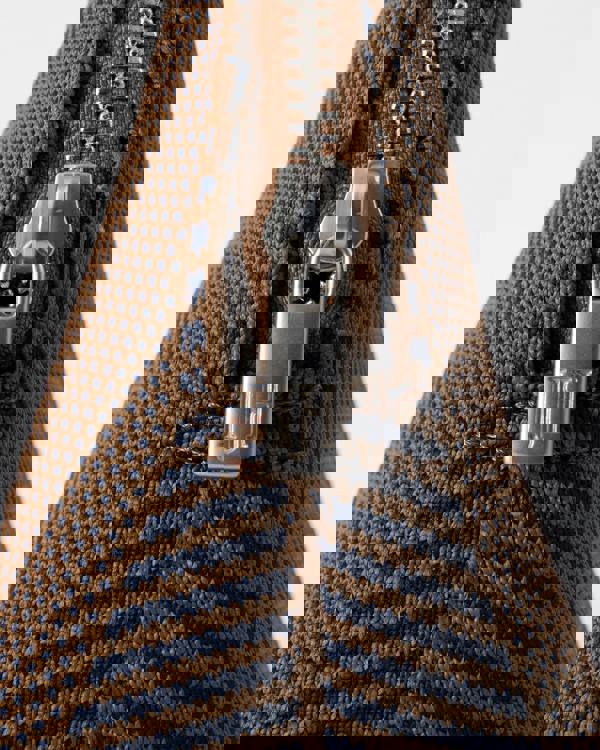 zip detail of of Ilse Jacobsen Knitty Womens Knitted Makeup Bag in Dark Indigo and Buckthorn Brown