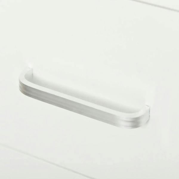 White desk edge with smooth rounded finish, close-up