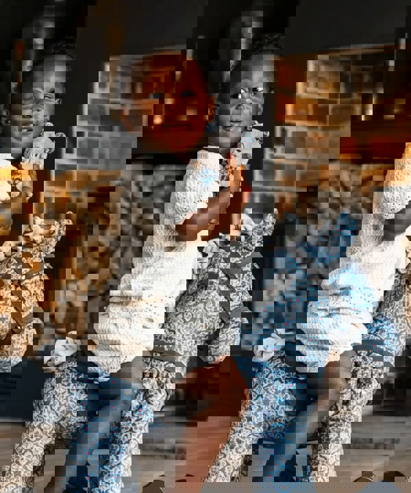 louie & duke blue rocking horse in living room 