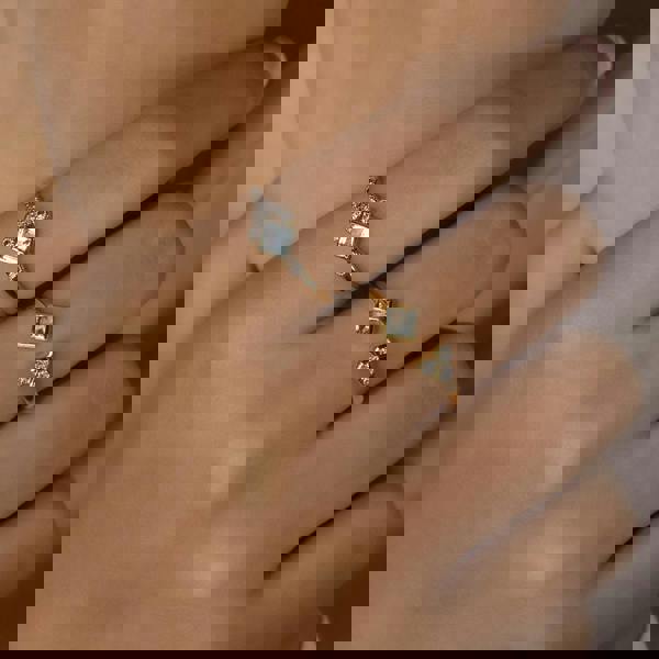 135R1864029 Contemporary Blue Topaz & Diamond Open Ring in 9ct Yellow Gold 4