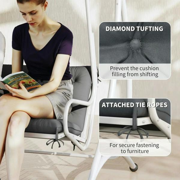Dark grey tufted bench cushion with attached tie ropes for secure fitting