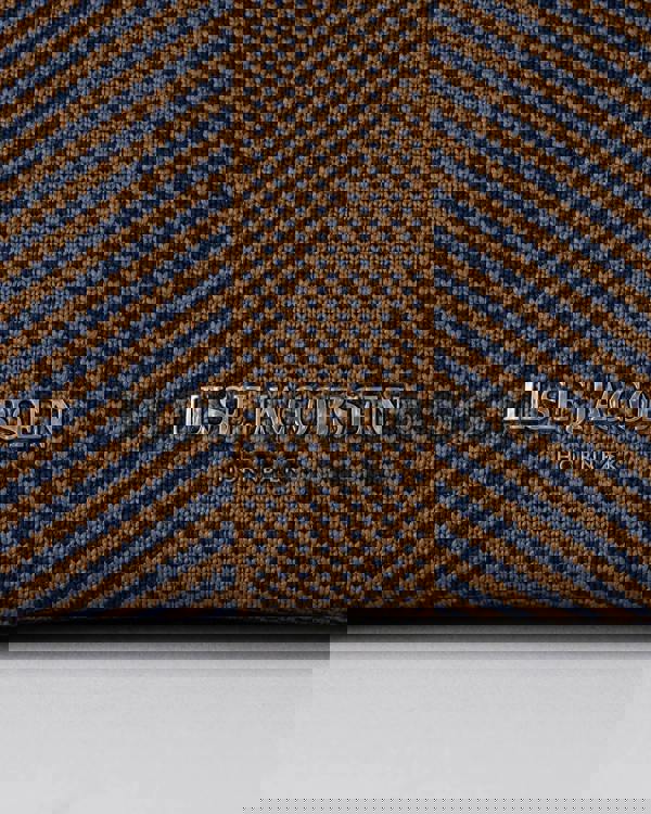 logo detail of Ilse Jacobsen Knitty Womens Knitted Makeup Bag in Dark Indigo and Buckthorn Brown