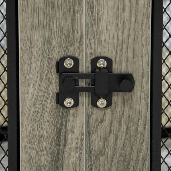 Black door latch and hinge hardware on grey dog cage mesh panel