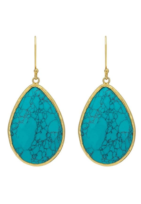 Gold framed turquoise teardrop earrings.
