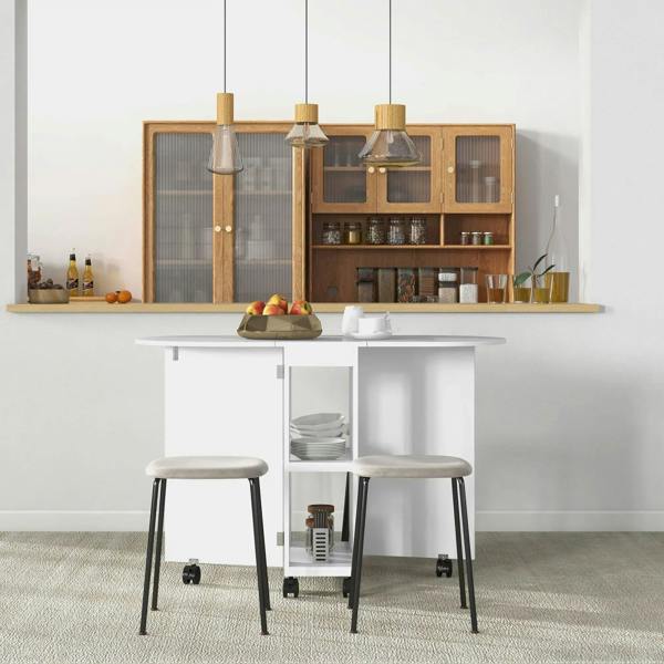 White drop-leaf dining table with two open side storage shelves and four rolling stools